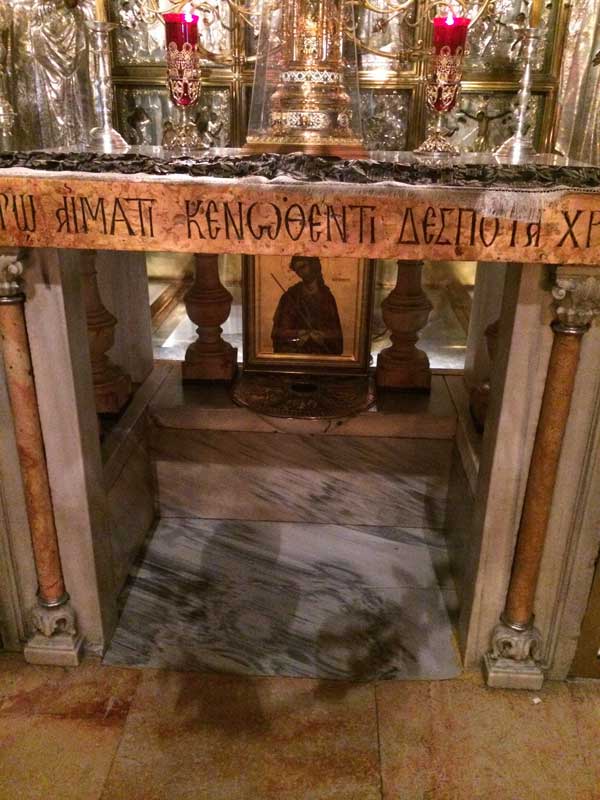 The site of Christ's crucifixion in the Church of the Anastasis (Holy Sepulcher)